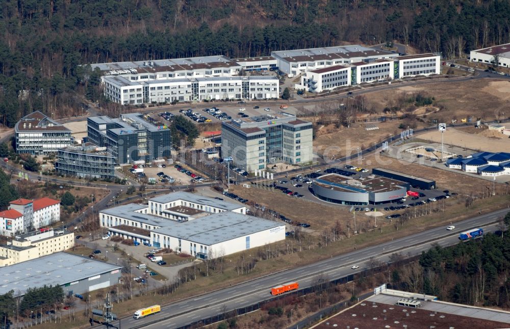 Aerial photograph Kleinmachnow - The expansion of the commercial site Europarc Dreilinden Kleinmachnow OT Dreilinden in Brandenburg. The Business Campus EUROPARC DREILINDEN serves more than 80 companies the company headquarters