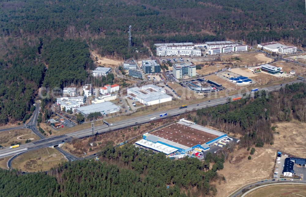 Kleinmachnow from above - The expansion of the commercial site Europarc Dreilinden Kleinmachnow OT Dreilinden in Brandenburg. The Business Campus EUROPARC DREILINDEN serves more than 80 companies the company headquarters