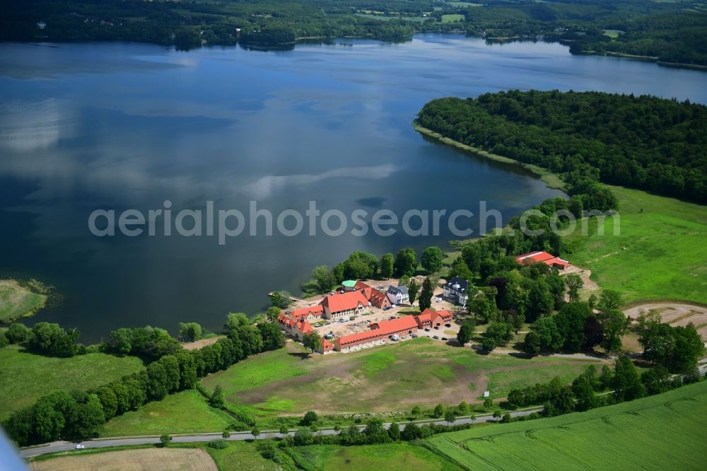 Aerial image Malente - Construction sites for redevelopment, renovation to expansion of the buildings and manor house of the estate Gut Immenhof on the banks of the Kellersee in Malente in the Holsteinische Schweiz in the state Schleswig-Holstein, Germany