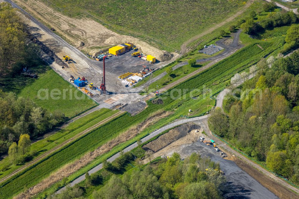 Bergkamen from the bird's eye view: Expansion of the bypass - bypass Kuhbachbruecke on the L821n between Erich-Ollenhauer-Strasse and Luenener Strasse at the In der Schlenke industrial estate in Bergkamen in the Ruhr area in the federal state of North Rhine-Westphalia, Germany