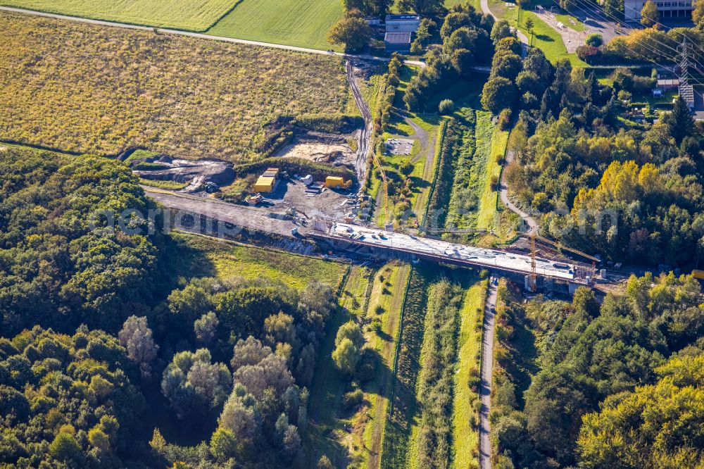 Bergkamen from the bird's eye view: Expansion of the bypass - bypass Kuhbachbruecke on the L821n between Erich-Ollenhauer-Strasse and Luenener Strasse at the In der Schlenke industrial estate in Bergkamen in the Ruhr area in the federal state of North Rhine-Westphalia, Germany