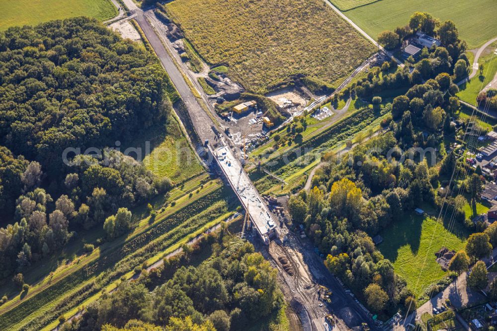 Aerial photograph Bergkamen - Expansion of the bypass - bypass Kuhbachbruecke on the L821n between Erich-Ollenhauer-Strasse and Luenener Strasse at the In der Schlenke industrial estate in Bergkamen in the Ruhr area in the federal state of North Rhine-Westphalia, Germany