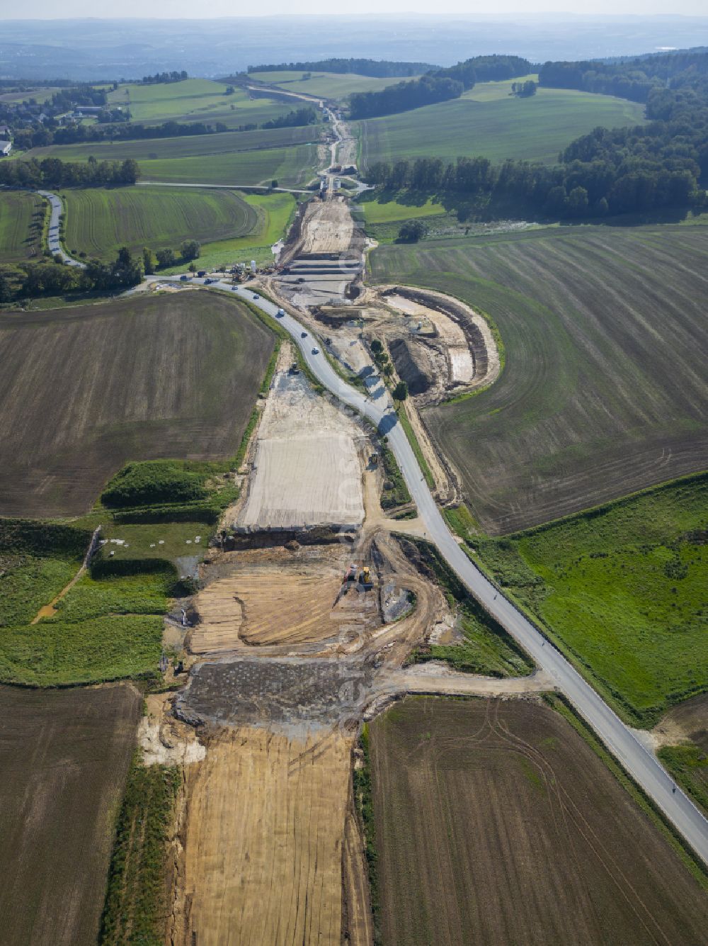 Aerial image Eschdorf - Construction of the bypass road in on street Pirnaer Strasse in Eschdorf in the state Saxony, Germany