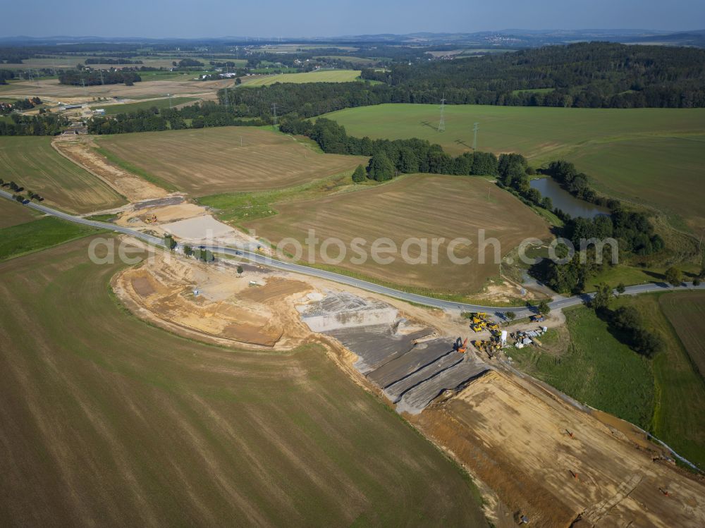 Aerial image Eschdorf - Construction of the bypass road in on street Pirnaer Strasse in Eschdorf in the state Saxony, Germany