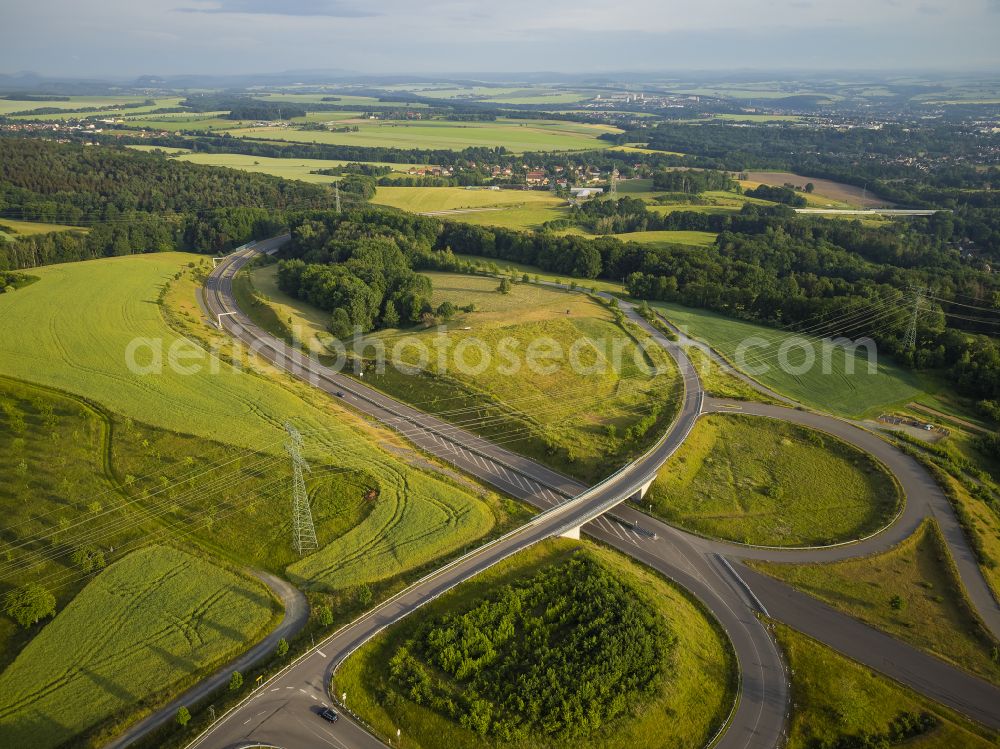 Eschdorf from the bird's eye view: Construction of the bypass road in on street Pirnaer Strasse in Eschdorf in the state Saxony, Germany