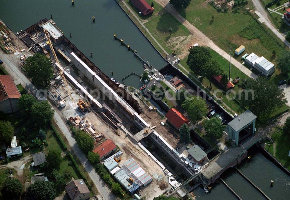 Aerial image Wernsdorf (Brandenburg) - Blick auf den Ausbau und die Instandsetzungsarbeiten der Wernsdorfer Schleuse. Die Schleuse ist eine von 4 Schleusen des Oder-Spree-Kanals. Beteiligtes Bauunternehmer u.a Heinrich Hecker GmbH & Co. KG. Vorr. Fertigstellung: Mai 2006 Bauherr: Wasser- und Schifffahrtsamt Berlin, Mehringdamm 129, 10965 Berlin, Tel. 030 / 69532 - 0, Fax: 030 / 69532 - 201, e-mail-Adresse: poststelle@wsa-b.wsv.de, Achim Walder-Adresse: