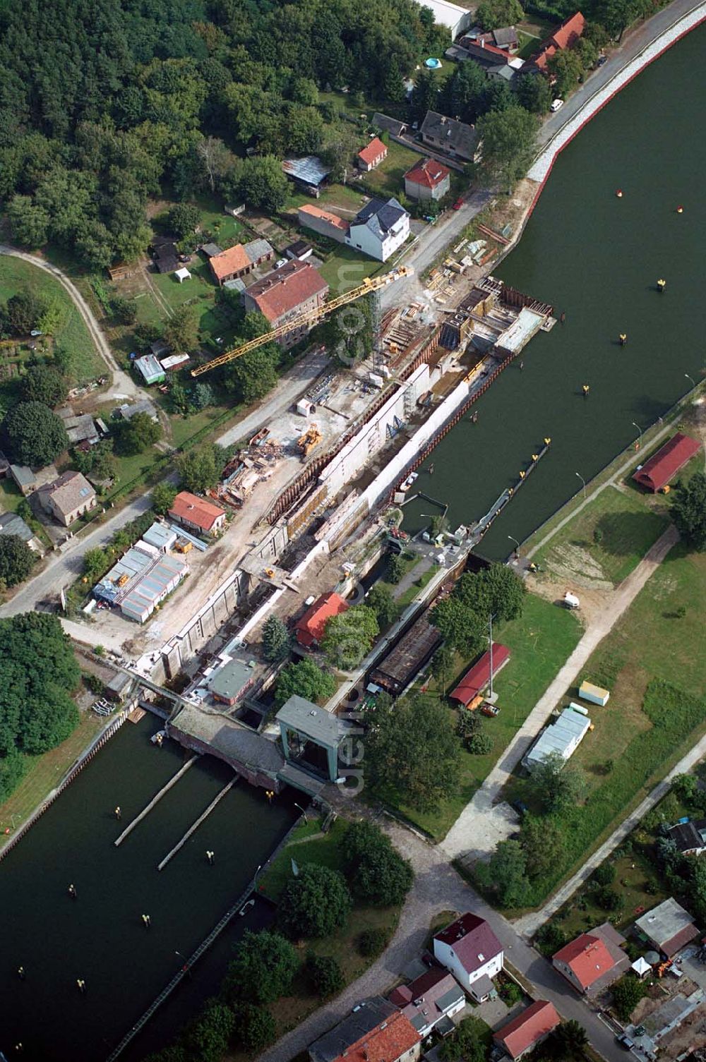 Wernsdorf (Brandenburg) from above - Blick auf den Ausbau und die Instandsetzungsarbeiten der Wernsdorfer Schleuse. Die Schleuse ist eine von 4 Schleusen des Oder-Spree-Kanals. Beteiligtes Bauunternehmer u.a Heinrich Hecker GmbH & Co. KG. Vorr. Fertigstellung: Mai 2006 Bauherr: Wasser- und Schifffahrtsamt Berlin, Mehringdamm 129, 10965 Berlin, Tel. 030 / 69532 - 0, Fax: 030 / 69532 - 201, e-mail-Adresse: poststelle@wsa-b.wsv.de, Achim Walder-Adresse: