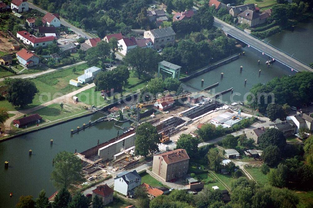 Wernsdorf (Brandenburg) from the bird's eye view: Blick auf den Ausbau und die Instandsetzungsarbeiten der Wernsdorfer Schleuse. Die Schleuse ist eine von 4 Schleusen des Oder-Spree-Kanals. Beteiligtes Bauunternehmer u.a Heinrich Hecker GmbH & Co. KG. Vorr. Fertigstellung: Mai 2006 Bauherr: Wasser- und Schifffahrtsamt Berlin, Mehringdamm 129, 10965 Berlin, Tel. 030 / 69532 - 0, Fax: 030 / 69532 - 201, e-mail-Adresse: poststelle@wsa-b.wsv.de, Achim Walder-Adresse: