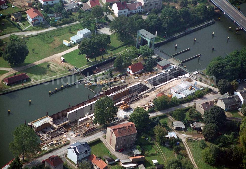 Aerial image Wernsdorf (Brandenburg) - Blick auf den Ausbau und die Instandsetzungsarbeiten der Wernsdorfer Schleuse. Die Schleuse ist eine von 4 Schleusen des Oder-Spree-Kanals. Beteiligtes Bauunternehmer u.a Heinrich Hecker GmbH & Co. KG. Vorr. Fertigstellung: Mai 2006 Bauherr: Wasser- und Schifffahrtsamt Berlin, Mehringdamm 129, 10965 Berlin, Tel. 030 / 69532 - 0, Fax: 030 / 69532 - 201, e-mail-Adresse: poststelle@wsa-b.wsv.de, Achim Walder-Adresse: