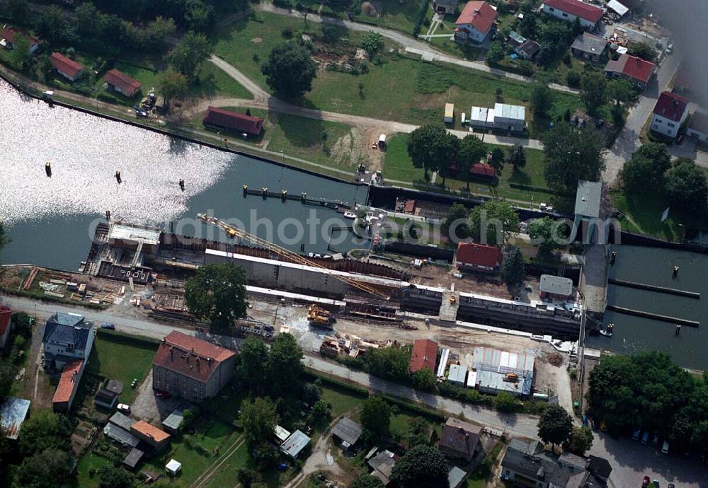 Aerial photograph Wernsdorf (Brandenburg) - Blick auf den Ausbau und die Instandsetzungsarbeiten der Wernsdorfer Schleuse. Die Schleuse ist eine von 4 Schleusen des Oder-Spree-Kanals. Beteiligtes Bauunternehmer u.a Heinrich Hecker GmbH & Co. KG. Vorr. Fertigstellung: Mai 2006 Bauherr: Wasser- und Schifffahrtsamt Berlin, Mehringdamm 129, 10965 Berlin, Tel. 030 / 69532 - 0, Fax: 030 / 69532 - 201, e-mail-Adresse: poststelle@wsa-b.wsv.de, Achim Walder-Adresse: