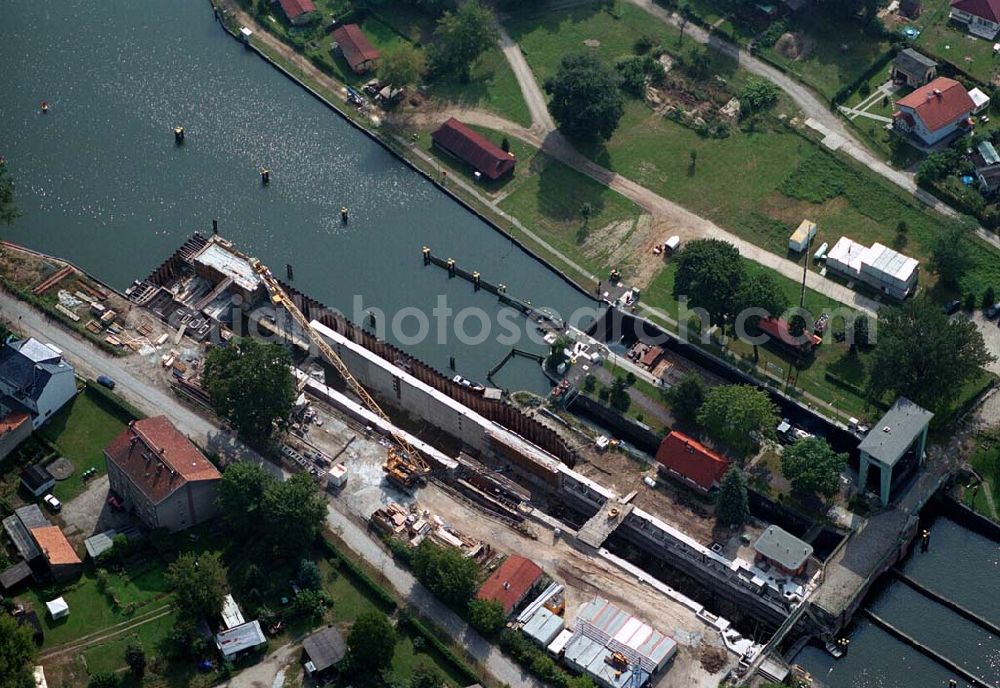 Wernsdorf (Brandenburg) from above - Blick auf den Ausbau und die Instandsetzungsarbeiten der Wernsdorfer Schleuse. Die Schleuse ist eine von 4 Schleusen des Oder-Spree-Kanals. Beteiligtes Bauunternehmer u.a Heinrich Hecker GmbH & Co. KG. Vorr. Fertigstellung: Mai 2006 Bauherr: Wasser- und Schifffahrtsamt Berlin, Mehringdamm 129, 10965 Berlin, Tel. 030 / 69532 - 0, Fax: 030 / 69532 - 201, e-mail-Adresse: poststelle@wsa-b.wsv.de, Achim Walder-Adresse: