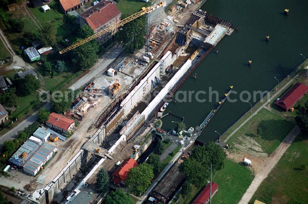 Aerial image Wernsdorf (Brandenburg) - Blick auf den Ausbau und die Instandsetzungsarbeiten der Wernsdorfer Schleuse. Die Schleuse ist eine von 4 Schleusen des Oder-Spree-Kanals. Beteiligtes Bauunternehmer u.a Heinrich Hecker GmbH & Co. KG. Vorr. Fertigstellung: Mai 2006 Bauherr: Wasser- und Schifffahrtsamt Berlin, Mehringdamm 129, 10965 Berlin, Tel. 030 / 69532 - 0, Fax: 030 / 69532 - 201, e-mail-Adresse: poststelle@wsa-b.wsv.de, Achim Walder-Adresse: