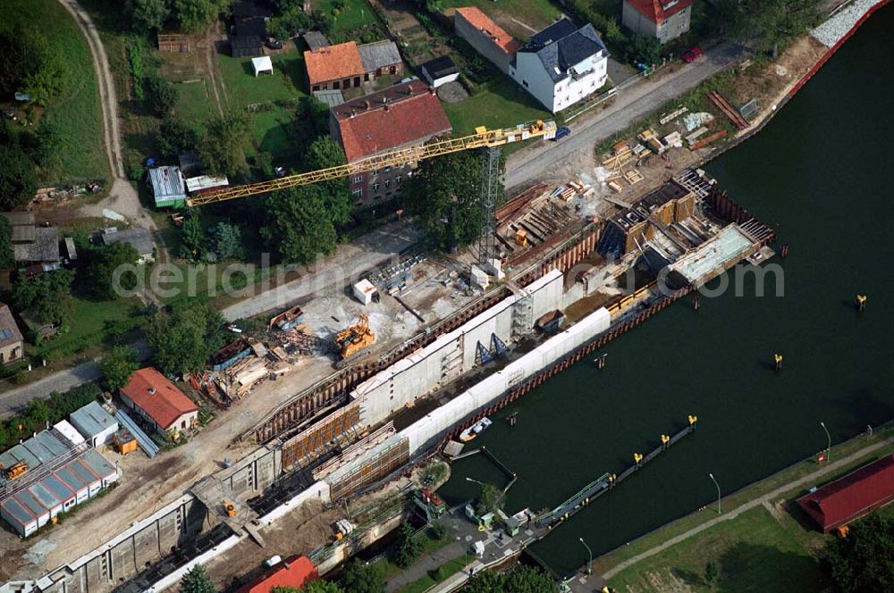 Aerial photograph Wernsdorf (Brandenburg) - Blick auf den Ausbau und die Instandsetzungsarbeiten der Wernsdorfer Schleuse. Die Schleuse ist eine von 4 Schleusen des Oder-Spree-Kanals. Beteiligtes Bauunternehmer u.a Heinrich Hecker GmbH & Co. KG. Vorr. Fertigstellung: Mai 2006 Bauherr: Wasser- und Schifffahrtsamt Berlin, Mehringdamm 129, 10965 Berlin, Tel. 030 / 69532 - 0, Fax: 030 / 69532 - 201, e-mail-Adresse: poststelle@wsa-b.wsv.de, Achim Walder-Adresse: