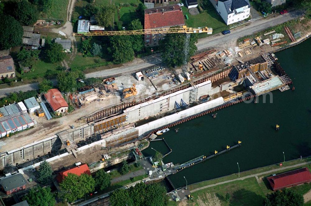 Wernsdorf (Brandenburg) from above - Blick auf den Ausbau und die Instandsetzungsarbeiten der Wernsdorfer Schleuse. Die Schleuse ist eine von 4 Schleusen des Oder-Spree-Kanals. Beteiligtes Bauunternehmer u.a Heinrich Hecker GmbH & Co. KG. Vorr. Fertigstellung: Mai 2006 Bauherr: Wasser- und Schifffahrtsamt Berlin, Mehringdamm 129, 10965 Berlin, Tel. 030 / 69532 - 0, Fax: 030 / 69532 - 201, e-mail-Adresse: poststelle@wsa-b.wsv.de, Achim Walder-Adresse: