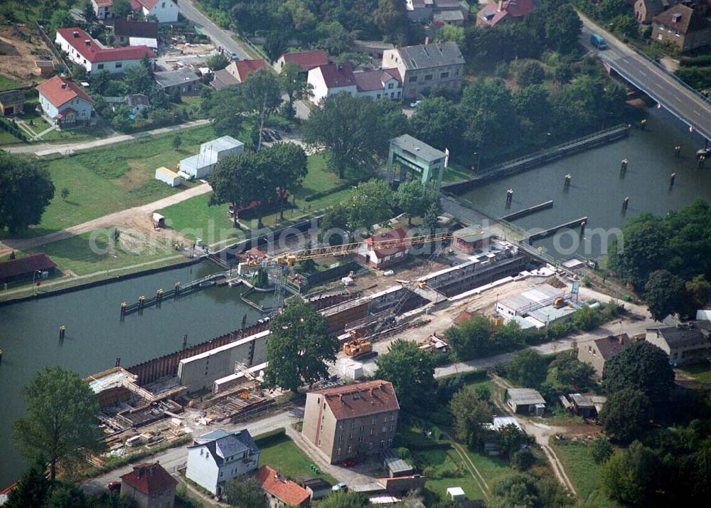 Wernsdorf (Brandenburg) from the bird's eye view: Blick auf den Ausbau und die Instandsetzungsarbeiten der Wernsdorfer Schleuse. Die Schleuse ist eine von 4 Schleusen des Oder-Spree-Kanals. Beteiligtes Bauunternehmer u.a Heinrich Hecker GmbH & Co. KG. Vorr. Fertigstellung: Mai 2006 Bauherr: Wasser- und Schifffahrtsamt Berlin, Mehringdamm 129, 10965 Berlin, Tel. 030 / 69532 - 0, Fax: 030 / 69532 - 201, e-mail-Adresse: poststelle@wsa-b.wsv.de, Achim Walder-Adresse: