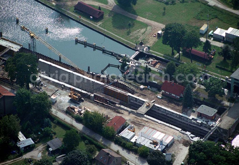 Aerial image Wernsdorf (Brandenburg) - Blick auf den Ausbau und die Instandsetzungsarbeiten der Wernsdorfer Schleuse. Die Schleuse ist eine von 4 Schleusen des Oder-Spree-Kanals. Beteiligtes Bauunternehmer u.a Heinrich Hecker GmbH & Co. KG. Vorr. Fertigstellung: Mai 2006 Bauherr: Wasser- und Schifffahrtsamt Berlin, Mehringdamm 129, 10965 Berlin, Tel. 030 / 69532 - 0, Fax: 030 / 69532 - 201, e-mail-Adresse: poststelle@wsa-b.wsv.de, Achim Walder-Adresse: