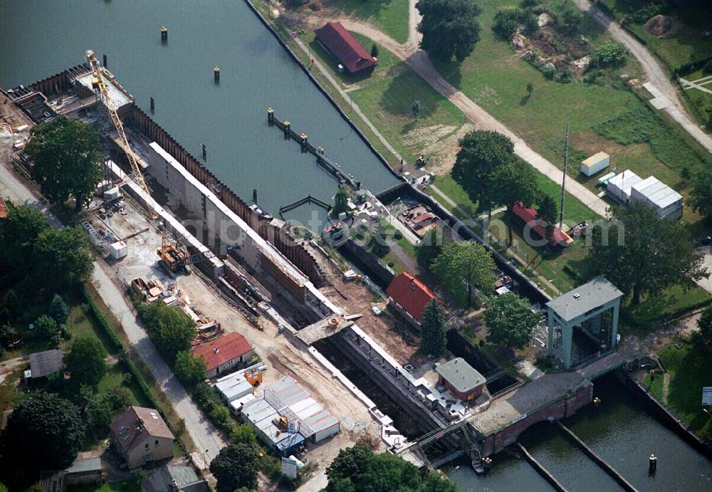 Aerial photograph Wernsdorf (Brandenburg) - Blick auf den Ausbau und die Instandsetzungsarbeiten der Wernsdorfer Schleuse. Die Schleuse ist eine von 4 Schleusen des Oder-Spree-Kanals. Beteiligtes Bauunternehmer u.a Heinrich Hecker GmbH & Co. KG. Vorr. Fertigstellung: Mai 2006 Bauherr: Wasser- und Schifffahrtsamt Berlin, Mehringdamm 129, 10965 Berlin, Tel. 030 / 69532 - 0, Fax: 030 / 69532 - 201, e-mail-Adresse: poststelle@wsa-b.wsv.de, Achim Walder-Adresse: