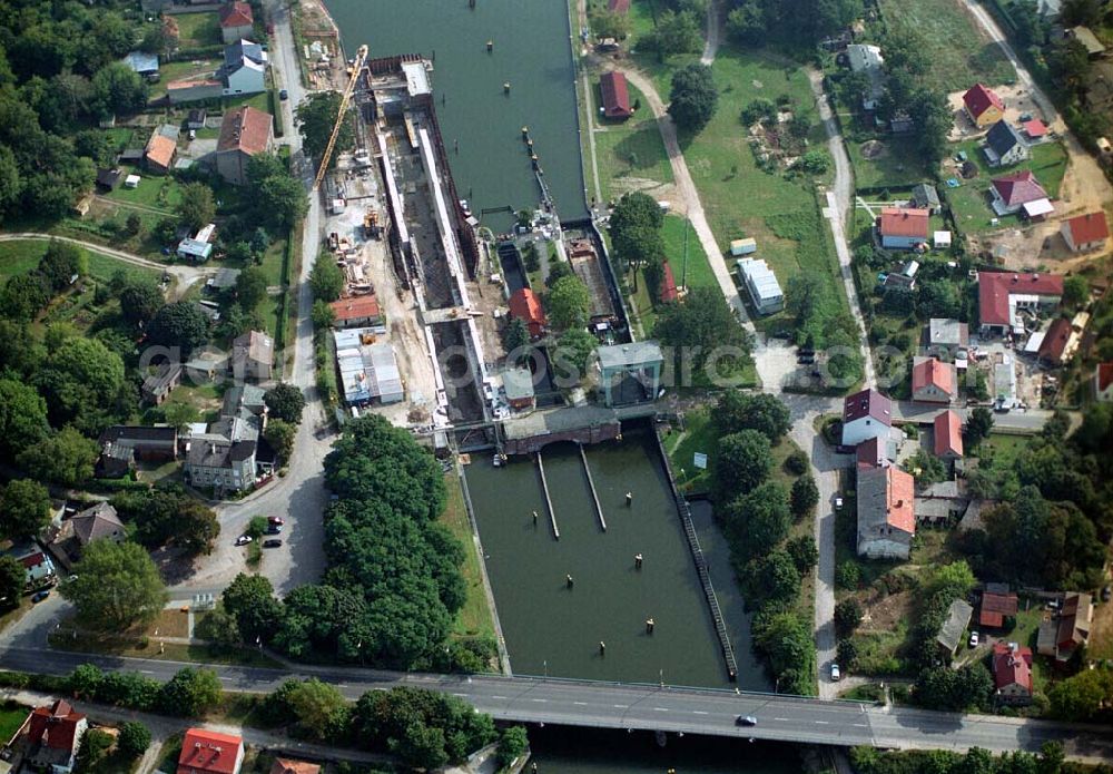 Wernsdorf (Brandenburg) from the bird's eye view: Blick auf den Ausbau und die Instandsetzungsarbeiten der Wernsdorfer Schleuse. Die Schleuse ist eine von 4 Schleusen des Oder-Spree-Kanals. Beteiligtes Bauunternehmer u.a Heinrich Hecker GmbH & Co. KG. Vorr. Fertigstellung: Mai 2006 Bauherr: Wasser- und Schifffahrtsamt Berlin, Mehringdamm 129, 10965 Berlin, Tel. 030 / 69532 - 0, Fax: 030 / 69532 - 201, e-mail-Adresse: poststelle@wsa-b.wsv.de, Achim Walder-Adresse: