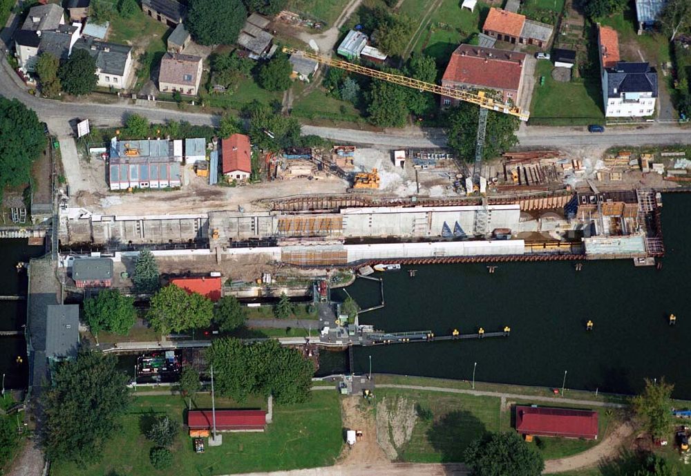 Aerial image Wernsdorf (Brandenburg) - Blick auf den Ausbau und die Instandsetzungsarbeiten der Wernsdorfer Schleuse. Die Schleuse ist eine von 4 Schleusen des Oder-Spree-Kanals. Beteiligtes Bauunternehmer u.a Heinrich Hecker GmbH & Co. KG. Vorr. Fertigstellung: Mai 2006 Bauherr: Wasser- und Schifffahrtsamt Berlin, Mehringdamm 129, 10965 Berlin, Tel. 030 / 69532 - 0, Fax: 030 / 69532 - 201, e-mail-Adresse: poststelle@wsa-b.wsv.de, Achim Walder-Adresse: