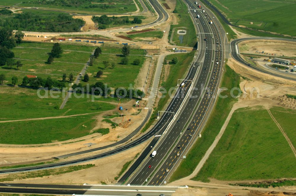 Aerial photograph Berlin - Blick auf die Autobahn A113. Die A113 verbindet den Berliner Stadtring A100 mit dem Berliner Ring A10. Zeitgleich mit der Erbauung des BBI- Flughafens wird die A113 ausgebaut, um eine bessere Infrastruktur zwischen Berlin und dem Flughafen zu gewährleisten. View of the motorway A113. The A113 joins the A100 Berlin with the Berliner Ring A10. Concurrent with the construction of the BBI airport, the A113 will be built out to ensure better infrastructure between Berlin and the airport.