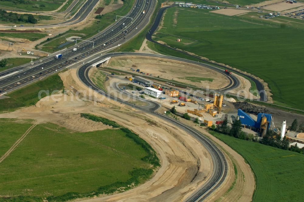 Berlin from above - Blick auf die Autobahn A113. Die A113 verbindet den Berliner Stadtring A100 mit dem Berliner Ring A10. Zeitgleich mit der Erbauung des BBI- Flughafens wird die A113 ausgebaut, um eine bessere Infrastruktur zwischen Berlin und dem Flughafen zu gewährleisten. View of the motorway A113. The A113 joins the A100 Berlin with the Berliner Ring A10. Concurrent with the construction of the BBI airport, the A113 will be built out to ensure better infrastructure between Berlin and the airport.