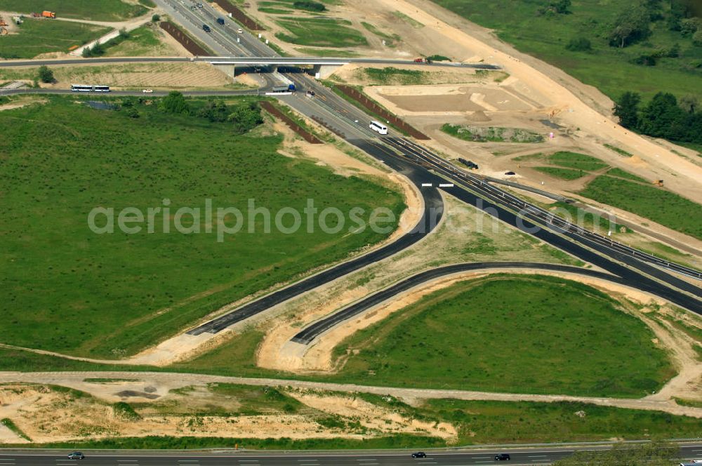 Berlin from the bird's eye view: Blick auf die Autobahn A113. Die A113 verbindet den Berliner Stadtring A100 mit dem Berliner Ring A10. Zeitgleich mit der Erbauung des BBI- Flughafens wird die A113 ausgebaut, um eine bessere Infrastruktur zwischen Berlin und dem Flughafen zu gewährleisten. View of the motorway A113. The A113 joins the A100 Berlin with the Berliner Ring A10. Concurrent with the construction of the BBI airport, the A113 will be built out to ensure better infrastructure between Berlin and the airport.