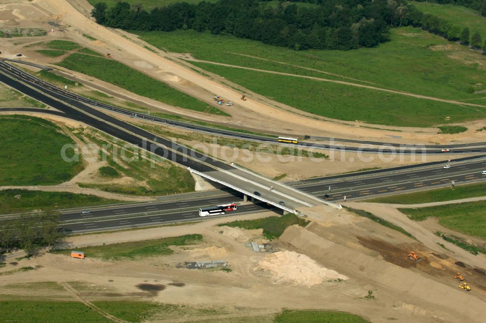 Aerial image Berlin - Blick auf die Autobahn A113. Die A113 verbindet den Berliner Stadtring A100 mit dem Berliner Ring A10. Zeitgleich mit der Erbauung des BBI- Flughafens wird die A113 ausgebaut, um eine bessere Infrastruktur zwischen Berlin und dem Flughafen zu gewährleisten. View of the motorway A113. The A113 joins the A100 Berlin with the Berliner Ring A10. Concurrent with the construction of the BBI airport, the A113 will be built out to ensure better infrastructure between Berlin and the airport.