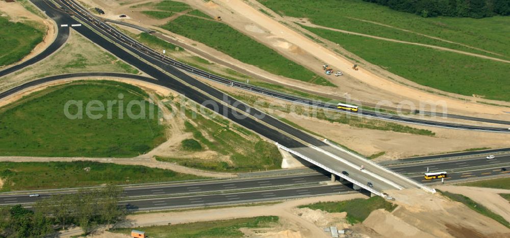 Aerial photograph Berlin - Blick auf die Autobahn A113. Die A113 verbindet den Berliner Stadtring A100 mit dem Berliner Ring A10. Zeitgleich mit der Erbauung des BBI- Flughafens wird die A113 ausgebaut, um eine bessere Infrastruktur zwischen Berlin und dem Flughafen zu gewährleisten. View of the motorway A113. The A113 joins the A100 Berlin with the Berliner Ring A10. Concurrent with the construction of the BBI airport, the A113 will be built out to ensure better infrastructure between Berlin and the airport.