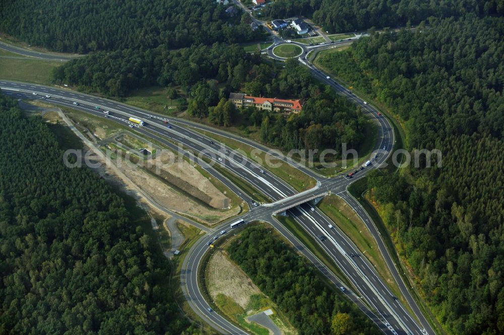 Stahnsdorf OT Güterfelde from the bird's eye view: Construction for the expansion and reconstruction of the country's road to L40 bypass Güterfelde in Brandenburg