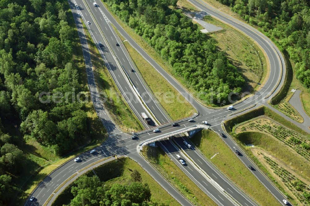 Güterfelde from the bird's eye view: Construction for the expansion and reconstruction of the country's road to L40 bypass Gueterfelde in Brandenburg