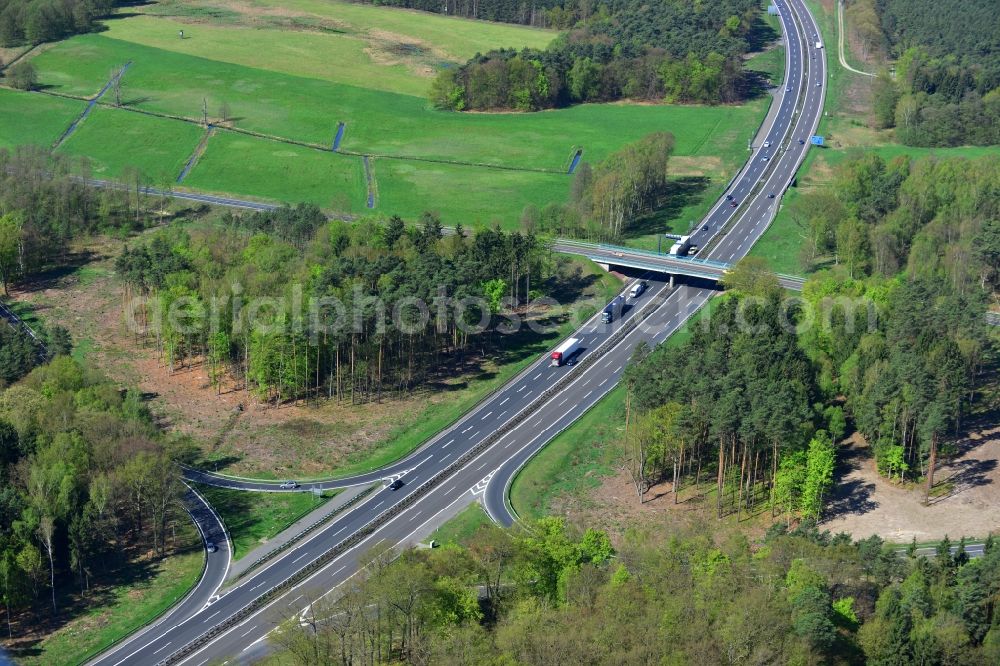 Spreeenhagen from the bird's eye view: Construction and widening of the route of the highway / motorway BAB A12 / E30 at the junction of State Road L23 at Spreenhagen in Brandenburg