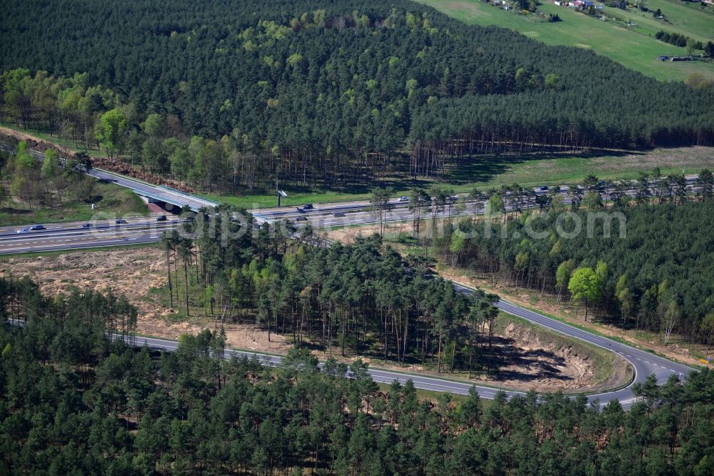 Dannenreich from the bird's eye view: Construction and widening of the route of the highway / motorway BAB A12 / E30 in the intersection of State Road L39 at Dannenreich in Brandenburg