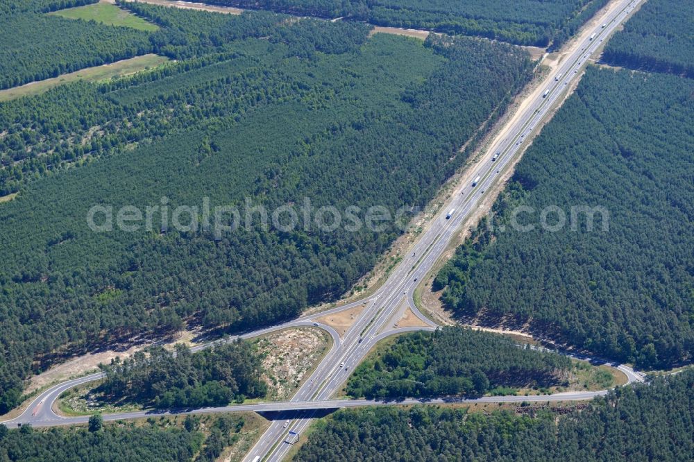 Dannenreich from the bird's eye view: Construction and widening of the route of the highway / motorway BAB A12 / E30 in the intersection of State Road L39 at Dannenreich in Brandenburg