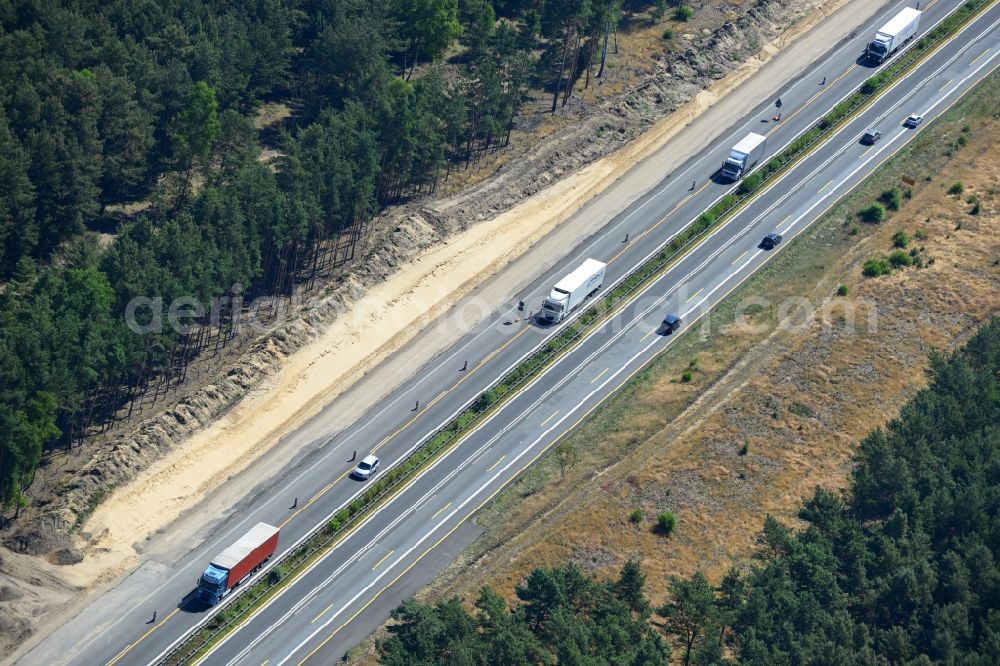 Dannenreich from the bird's eye view: Construction and widening of the route of the highway / motorway BAB A12 / E30 in the intersection of State Road L39 at Dannenreich in Brandenburg