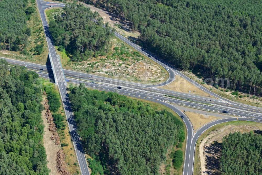 Dannenreich from the bird's eye view: Construction and widening of the route of the highway / motorway BAB A12 / E30 in the intersection of State Road L39 at Dannenreich in Brandenburg