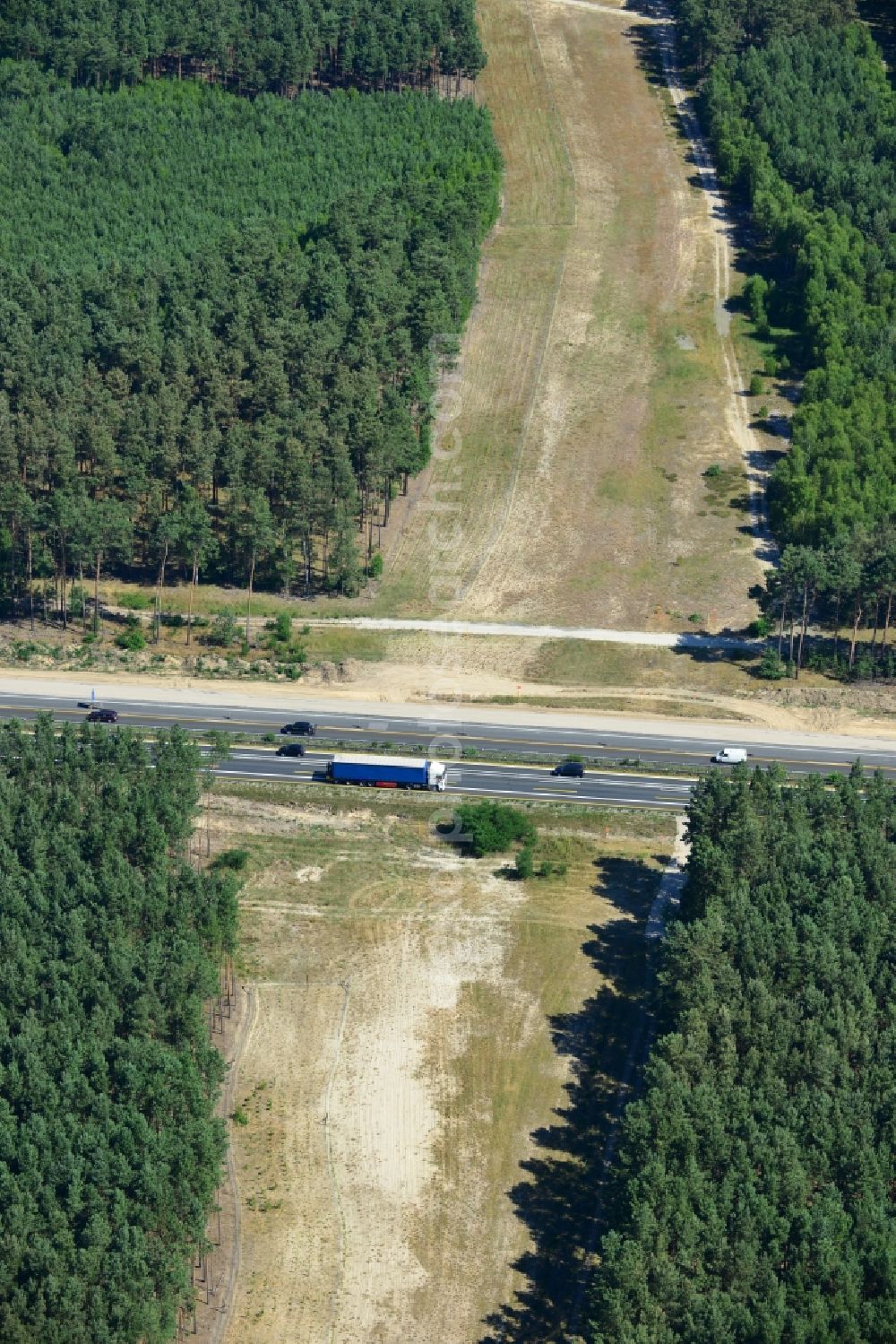 Dannenreich from the bird's eye view: Construction and widening of the route of the highway / motorway BAB A12 / E30 in the intersection of State Road L39 at Dannenreich in Brandenburg