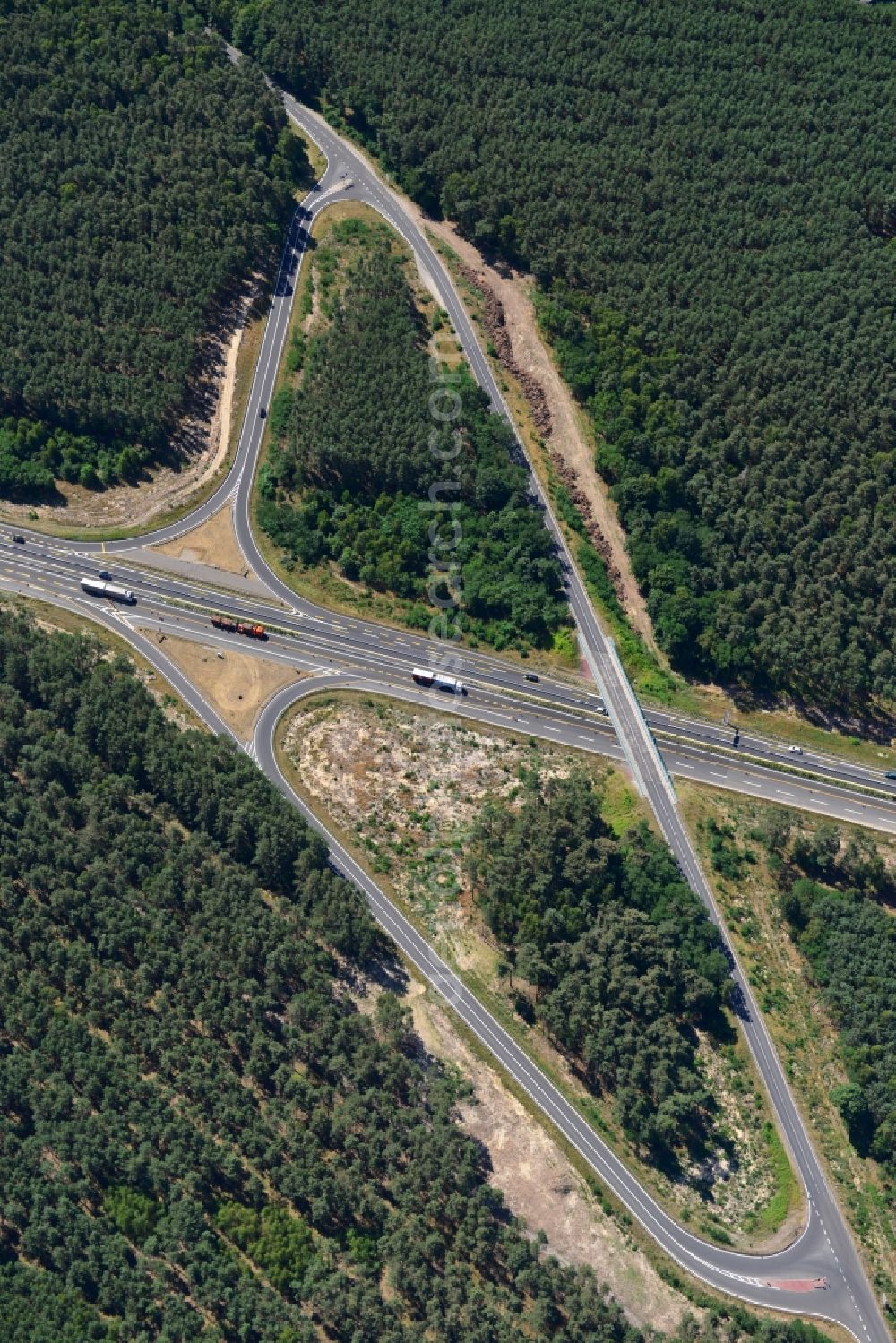 Dannenreich from the bird's eye view: Construction and widening of the route of the highway / motorway BAB A12 / E30 in the intersection of State Road L39 at Dannenreich in Brandenburg