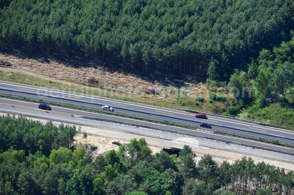 Dannenreich from the bird's eye view: Construction and widening of the route of the highway / motorway BAB A12 / E30 in the intersection of State Road L39 at Dannenreich in Brandenburg