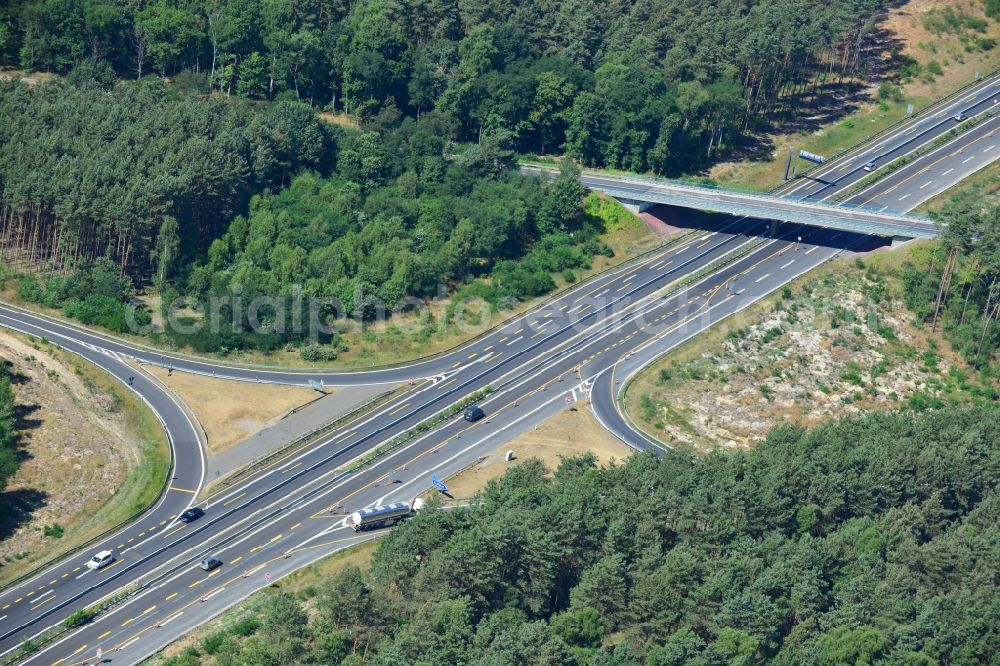 Dannenreich from the bird's eye view: Construction and widening of the route of the highway / motorway BAB A12 / E30 in the intersection of State Road L39 at Dannenreich in Brandenburg