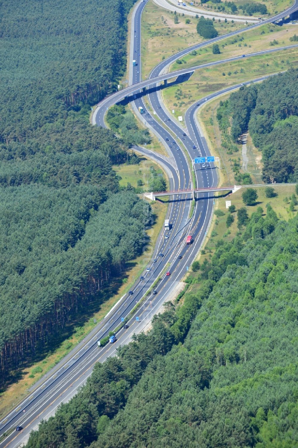 Dannenreich from the bird's eye view: Construction and widening of the route of the highway / motorway BAB A12 / E30 in the intersection of State Road L39 at Dannenreich in Brandenburg