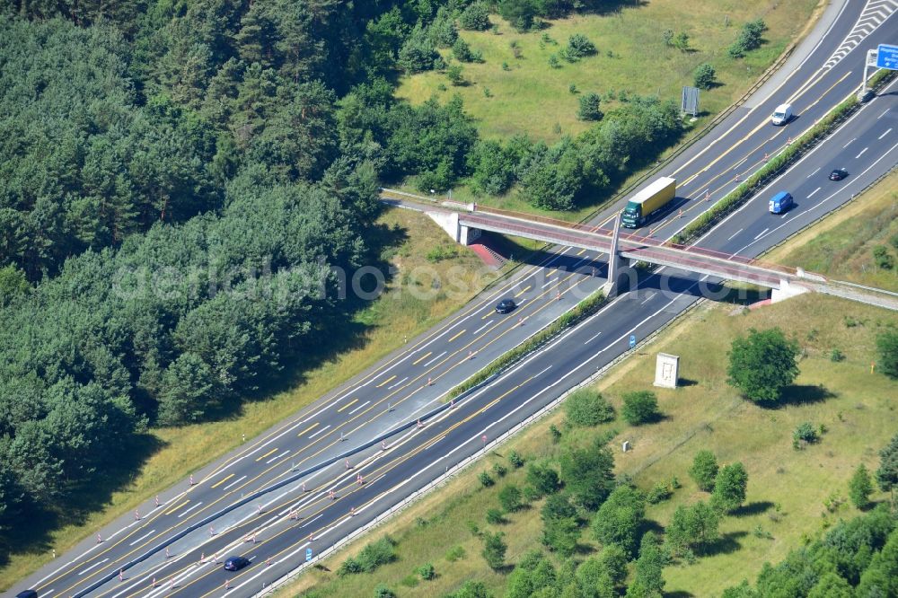 Dannenreich from the bird's eye view: Construction and widening of the route of the highway / motorway BAB A12 / E30 in the intersection of State Road L39 at Dannenreich in Brandenburg