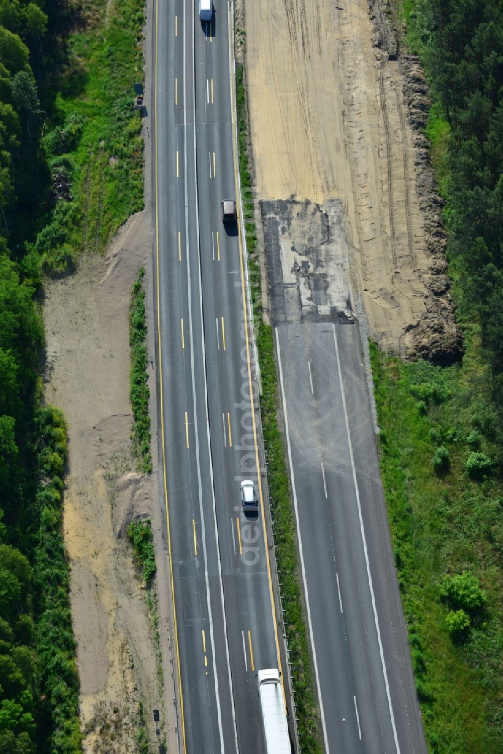 Dannenreich from the bird's eye view: Construction and widening of the route of the highway / motorway BAB A12 / E30 in the intersection of State Road L39 at Dannenreich in Brandenburg