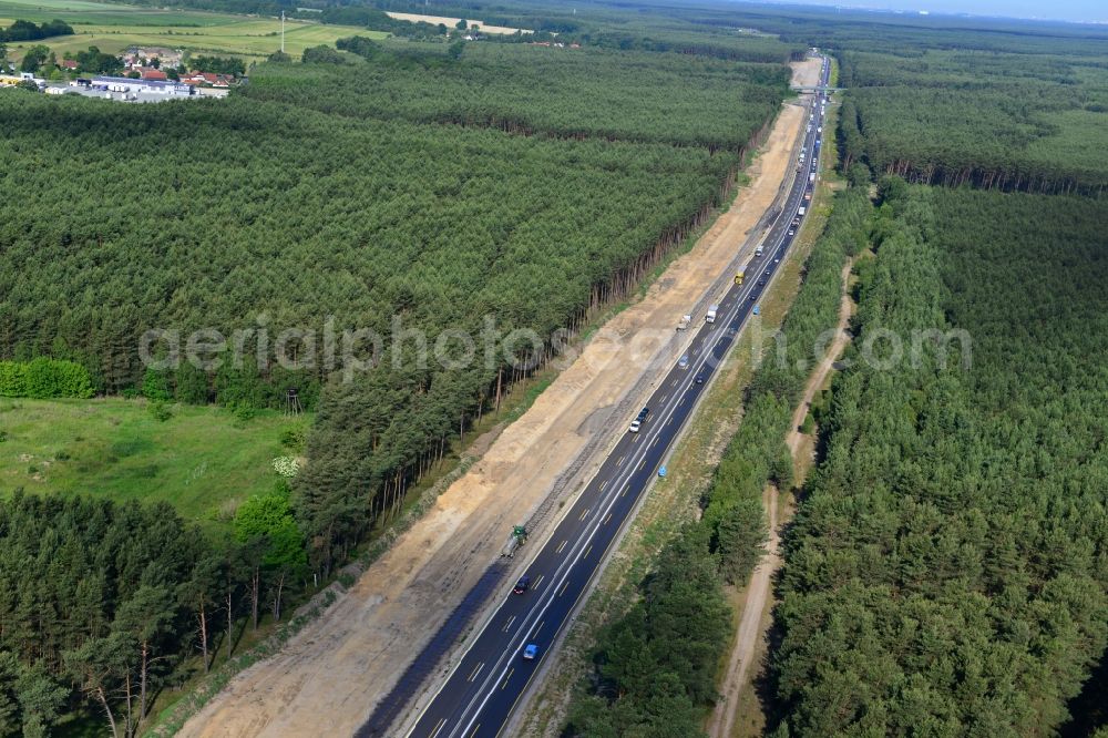 Dannenreich from the bird's eye view: Construction and widening of the route of the highway / motorway BAB A12 / E30 in the intersection of State Road L39 at Dannenreich in Brandenburg