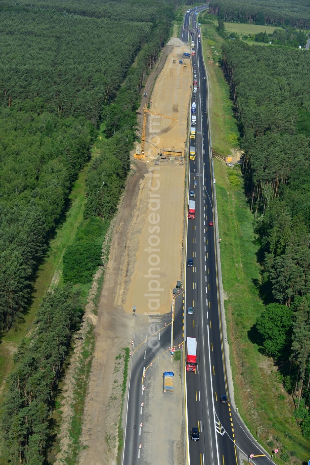 Dannenreich from the bird's eye view: Construction and widening of the route of the highway / motorway BAB A12 / E30 in the intersection of State Road L39 at Dannenreich in Brandenburg