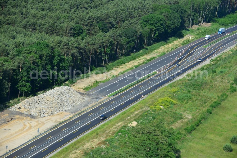 Dannenreich from the bird's eye view: Construction and widening of the route of the highway / motorway BAB A12 / E30 in the intersection of State Road L39 at Dannenreich in Brandenburg