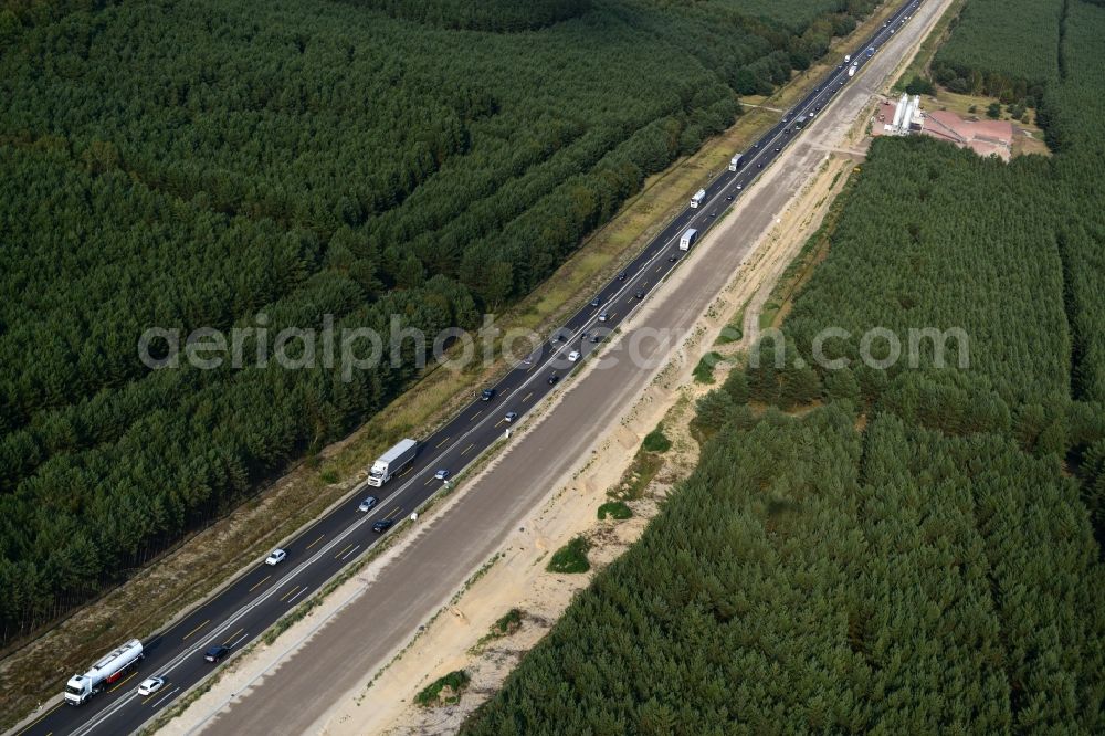 Friedersdorf from the bird's eye view: Construction and widening of the route of the highway / motorway BAB A12 at Friedersdorf at the Berliner Ring in Brandenburg