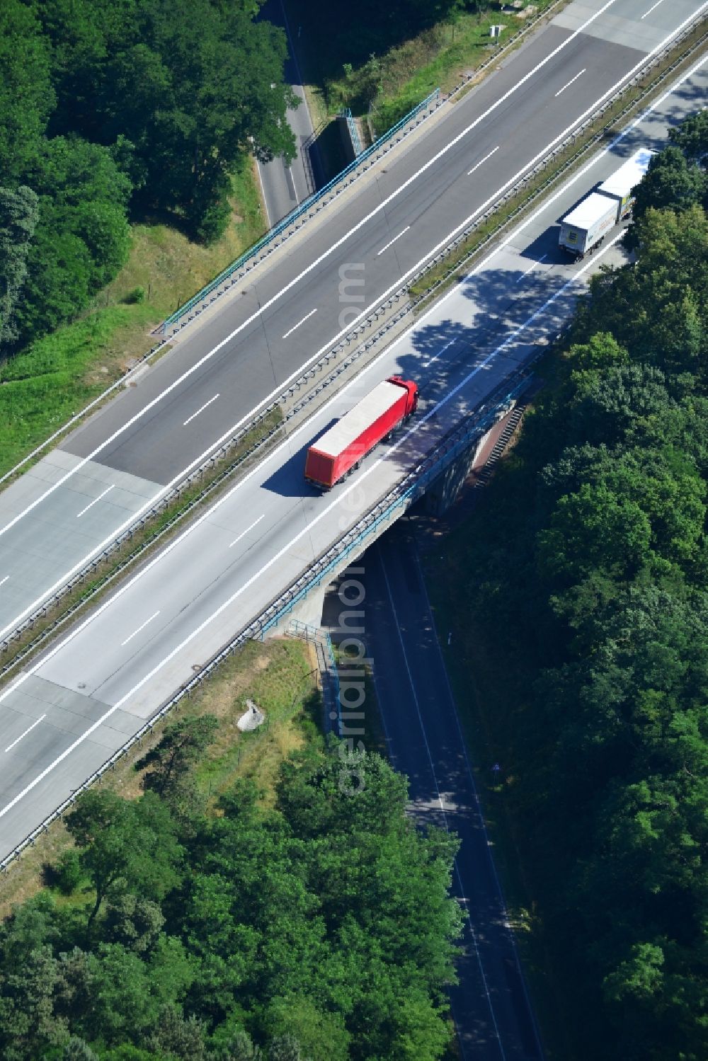 Rauen from the bird's eye view: Construction and widening of the route of the highway / motorway BAB A12 / E30 at Rauen in Brandenburg