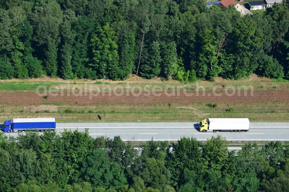 Rauen from the bird's eye view: Construction and widening of the route of the highway / motorway BAB A12 / E30 at Rauen in Brandenburg