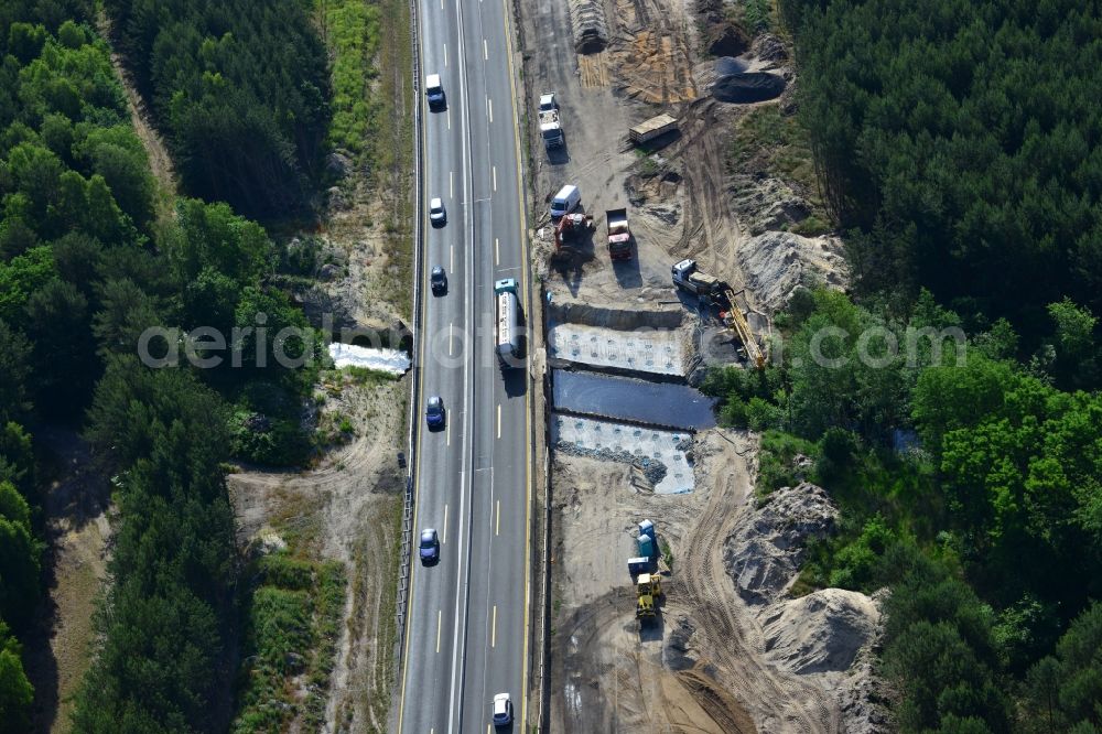 Rauen from the bird's eye view: Construction and widening of the route of the highway / motorway BAB A12 / E30 at Rauen in Brandenburg