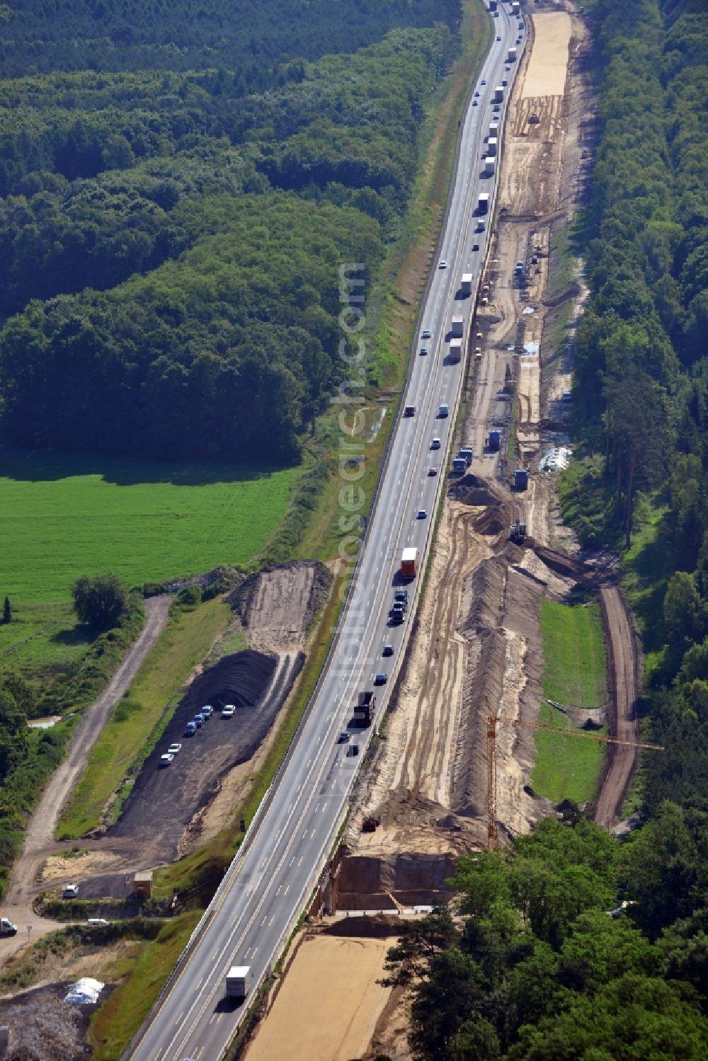 Rauen from the bird's eye view: Construction and widening of the route of the highway / motorway BAB A12 / E30 at Rauen in Brandenburg